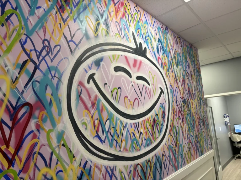 logo and banner at the smile spot in round rock
